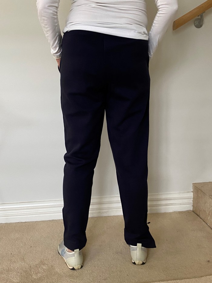 Track pants with zip, back